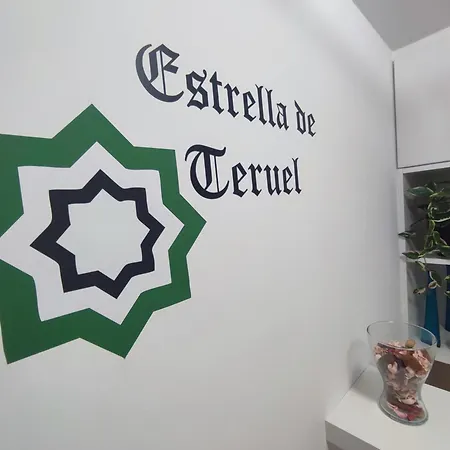 Estrella De *